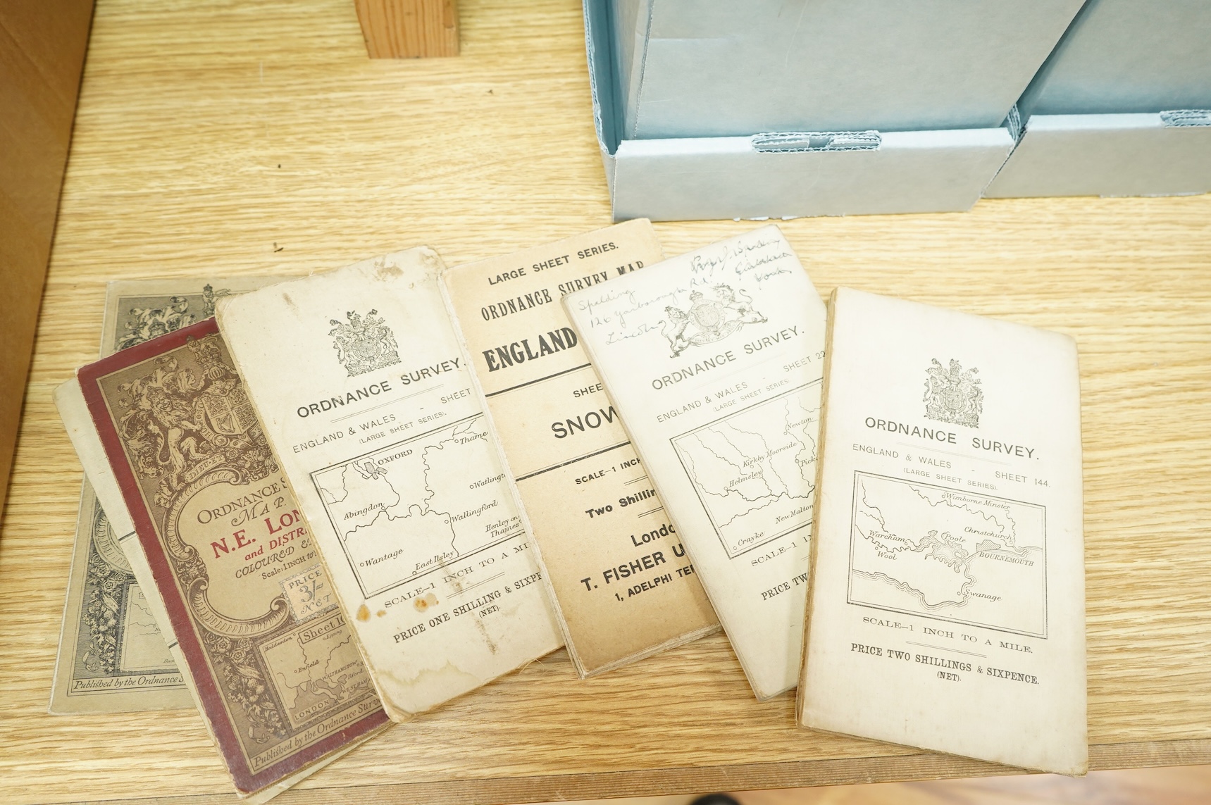 A collection of twenty-one late 19th century Ordnance Survey maps, many in slip cases, including the Revised New Series and Third Edition, areas covered include; Basingstoke, Hastings, Maidstone, Canterbury, Dorking, Sno